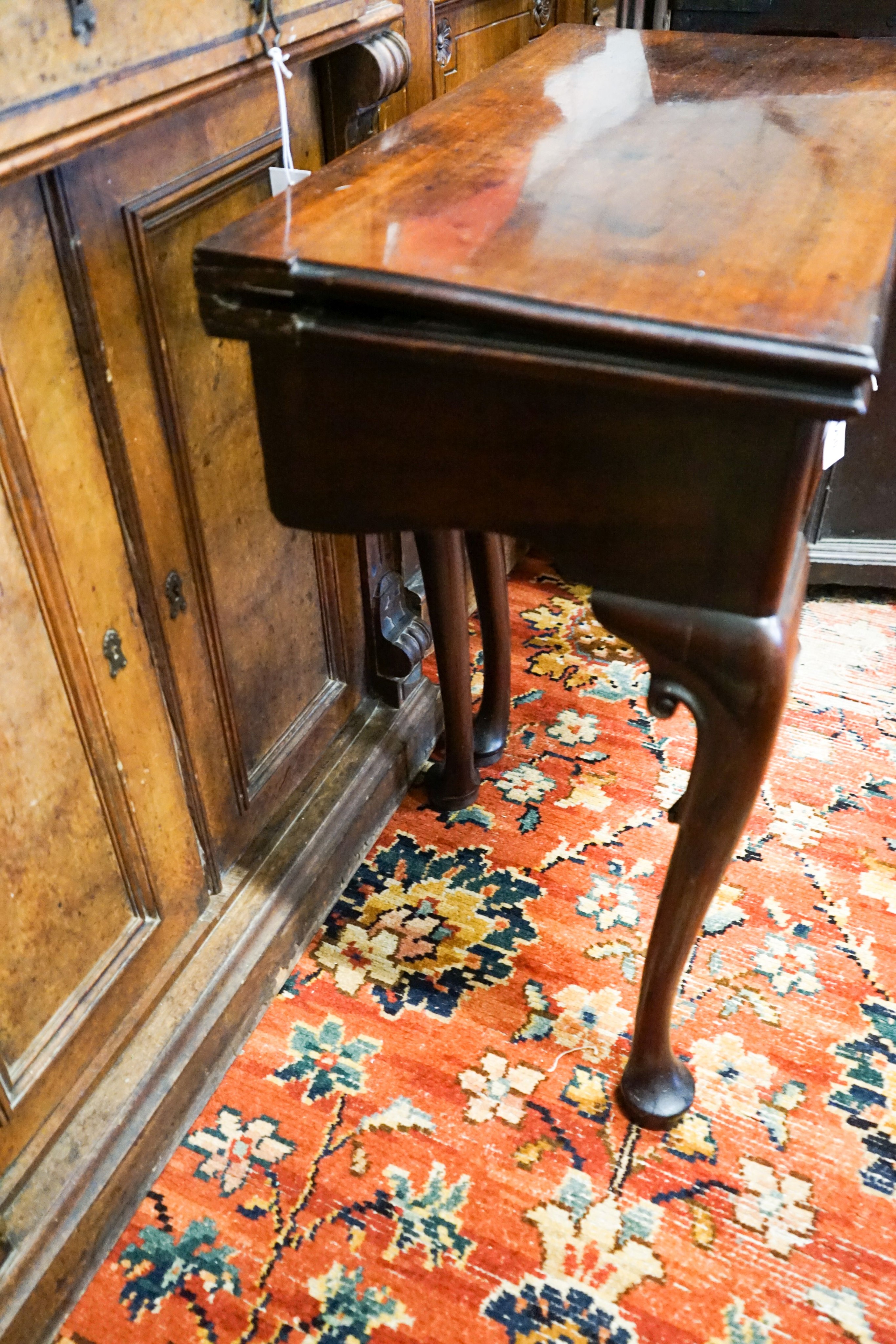 A George II Irish style rectangular folding tea table, width 76cm, depth 37cm, height 74cm